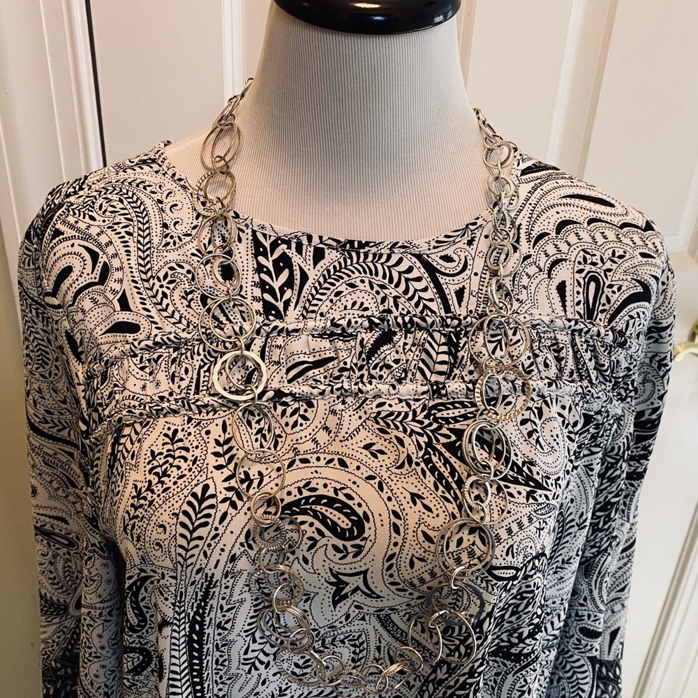 Loft woman’s dress size L. Long sleeve keyhole button back